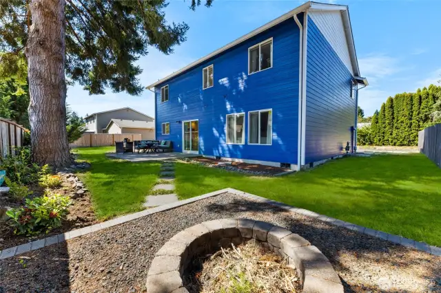 Large, level yard with firepit