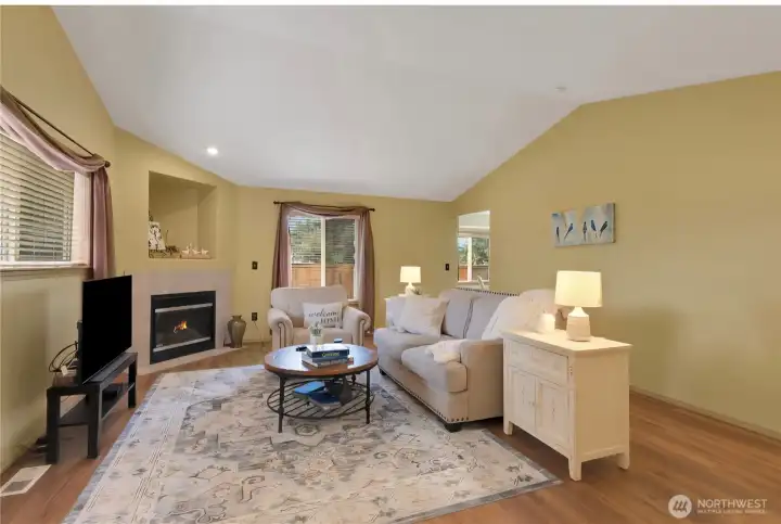 Great Room with vaulted ceiling, gas fireplace.