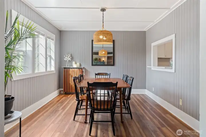 Formal dining room filled with natural light—perfect for gatherings.