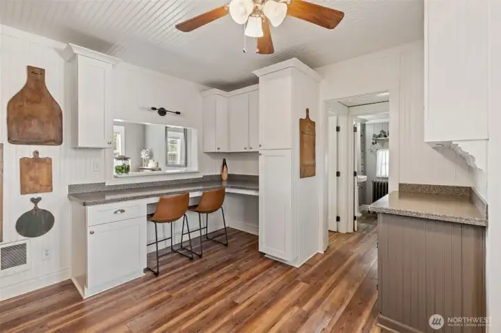 Seamless flow between kitchen, dining, and living areas.