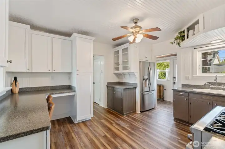 Bright kitchen layout designed for both cooking and gathering.