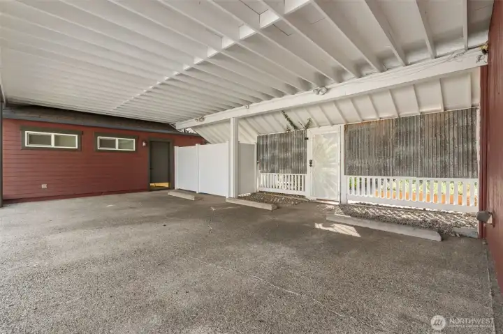 Covered parking area offers convenience and protection year-round.