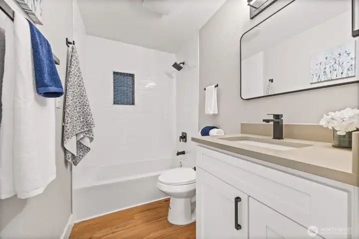 Full bath with tiled shower
