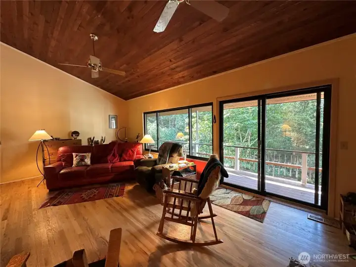 Living room on the main with beautiful hardwood floors, deck access.