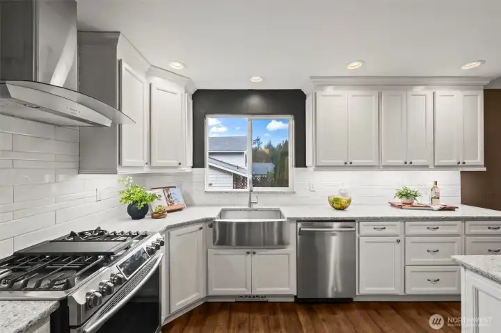 Ceiling-height custom cabinets with crown moulding are elegant and so much storage!