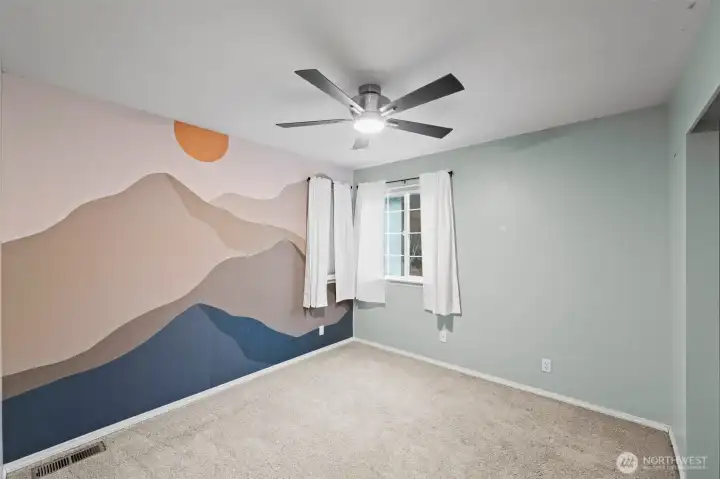 Bedroom 2 features a PNW graphic and remote control blinds.