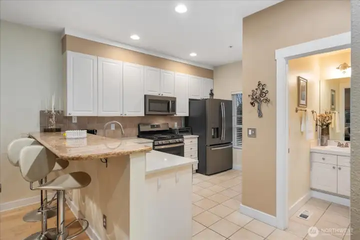 Convenient guest powder room off main living area.