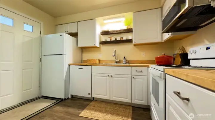 Kitchen for Unit B, currently operates as STR. Furnishings NOT included.