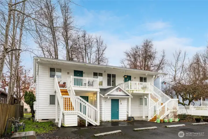 Rear entries to the units. Middle door, ground level is the laundry room.