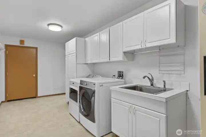 Utility sink for ease in the oversized laundry room.