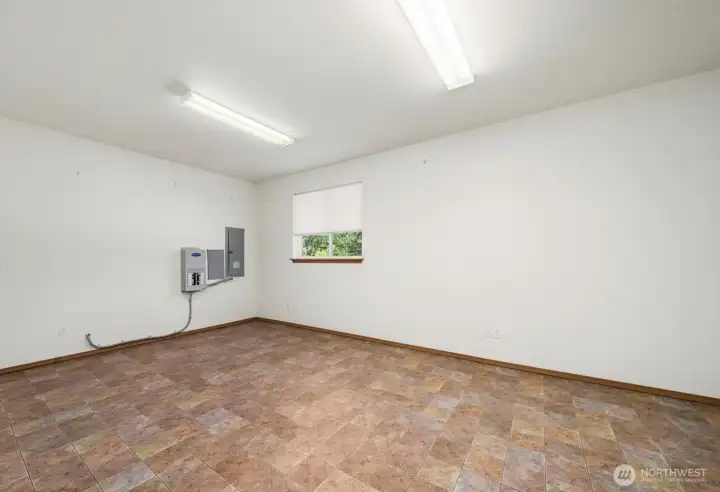 Flex room #2 you access through the garage. It was used as an office, but maybe workout room? Or very large dry storage room?