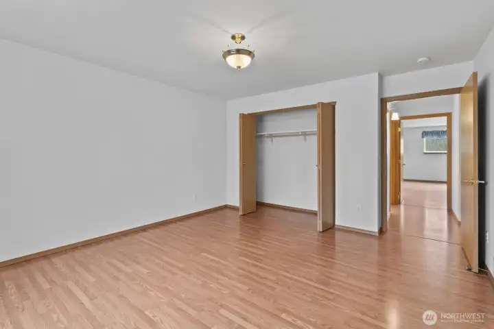 2nd bedroom offers an oversized room with a closet for your belongings.