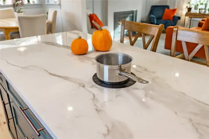Invisacook range beneath porcelain counter tops.