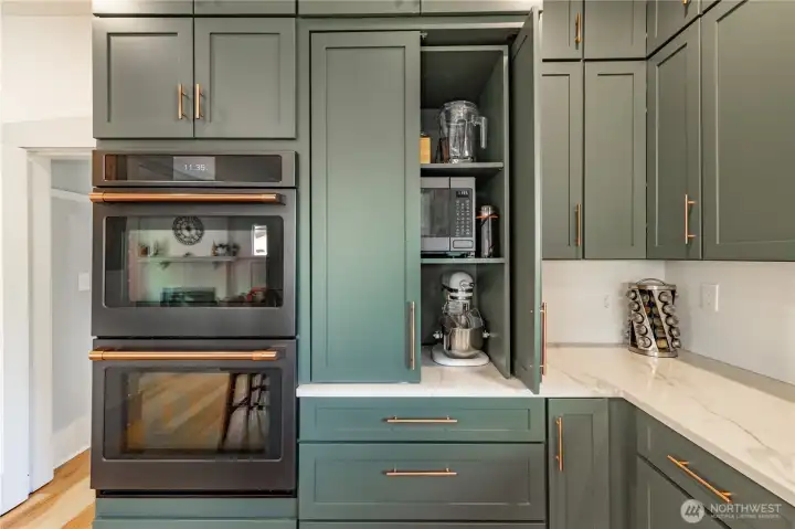 Appliance cabinet for easy access and storage.