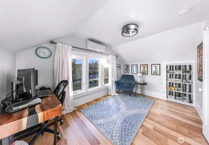 Third bedroom/office. Note on far right a door that appears to be shelving. This opens to storage space/closet