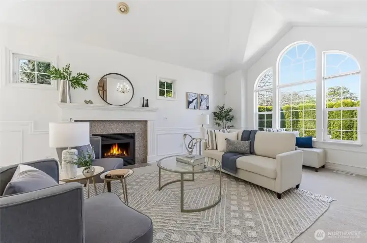 Bright living room with expansive windows allowing abundant natural light to pour in