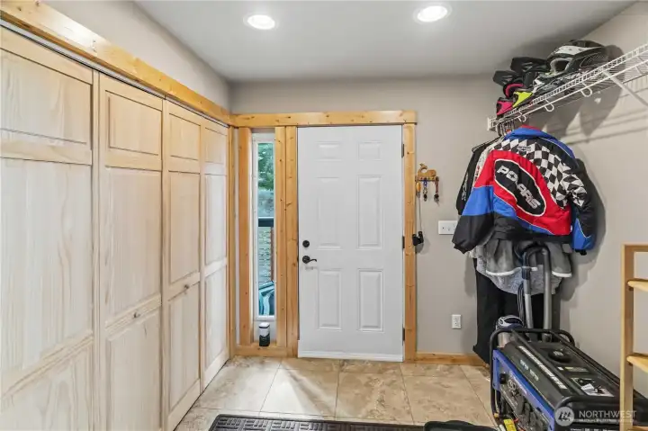 Entry - Laundry Room on the Left Behind Closet Doors