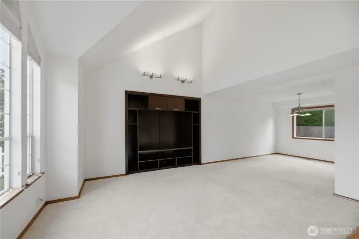 Large living room with built ins, vaulted ceiling Large living room with built ins, vaulted ceiling