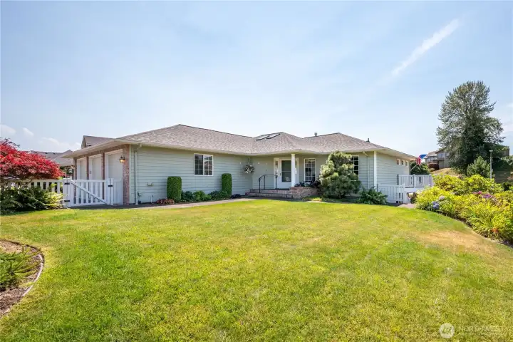 Beautiful yard with mature lanscaping and fully fenced