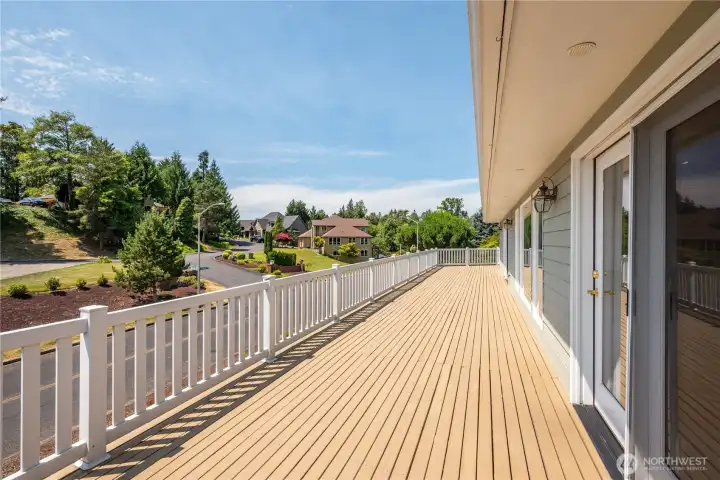 Expansive deck with river and city views