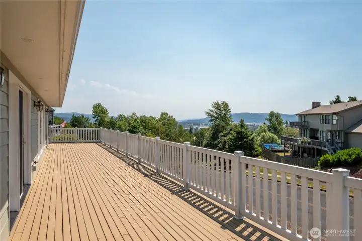 Expansive deck with river and city views