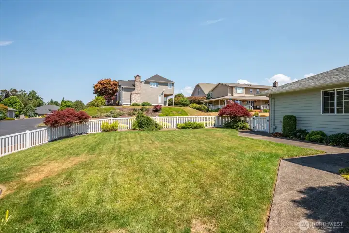 Mature landscaping and fully fenced yard