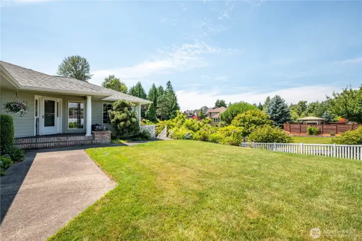 Mature landscaping and fully fenced yard