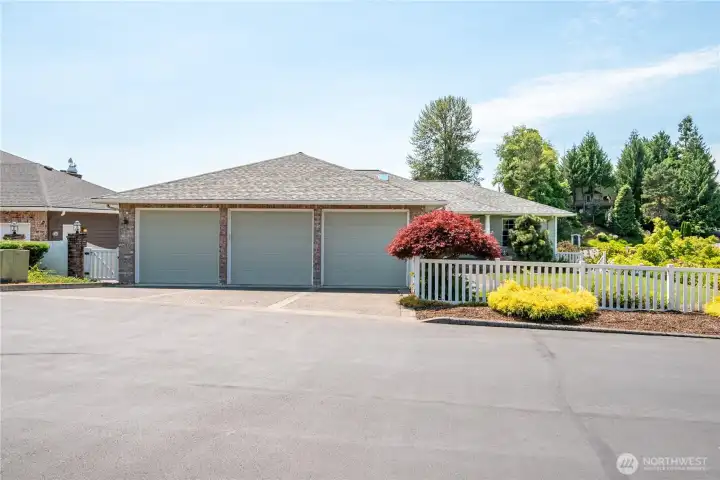 Spacious three car garage with workspace