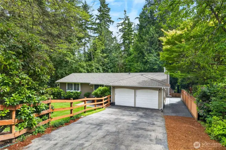 Nestled among towering evergreens and lush landscaping, this beautifully maintained home offers exceptional privacy, a spacious driveway, and a peaceful retreat-like setting just minutes from everyday conveniences. Nestled among towering evergreens and lush landscaping, this beautifully maintained home offers exceptional privacy, a spacious driveway, and a peaceful retreat-like setting just minutes from everyday conveniences.