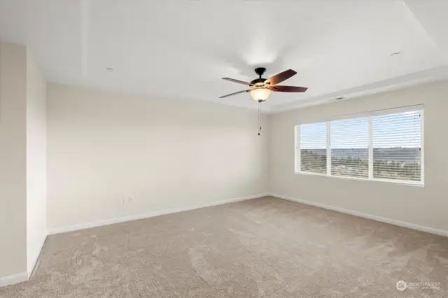 Primary with views of the valley.  Nice sized with massive walk in closet.