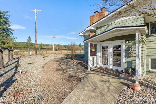 The covered front porch offers a warm and inviting welcome, creating the perfect spot to greet guests. Complementing this charming entry is the newly landscaped front yard, which adds a fresh touch to the home’s curb appeal