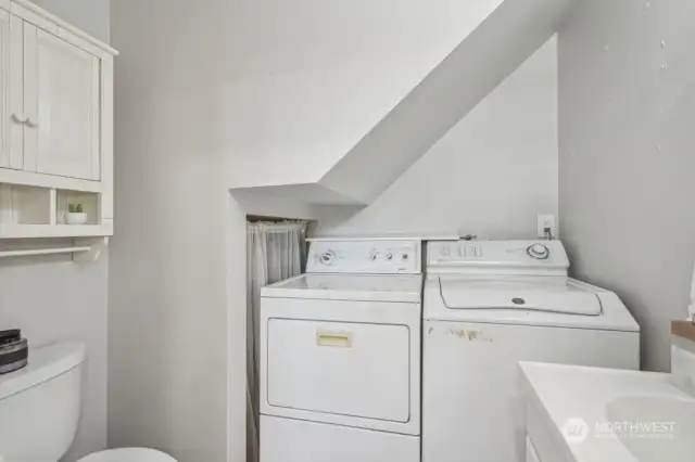 Downstairs powder room with laundry