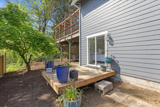 Backyard deck just off the 4th (non-conforming) bedroom.