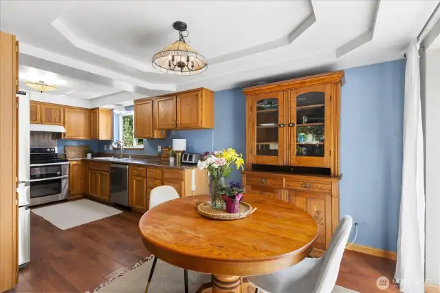 Gorgeous tray ceilings highlight the dining area.