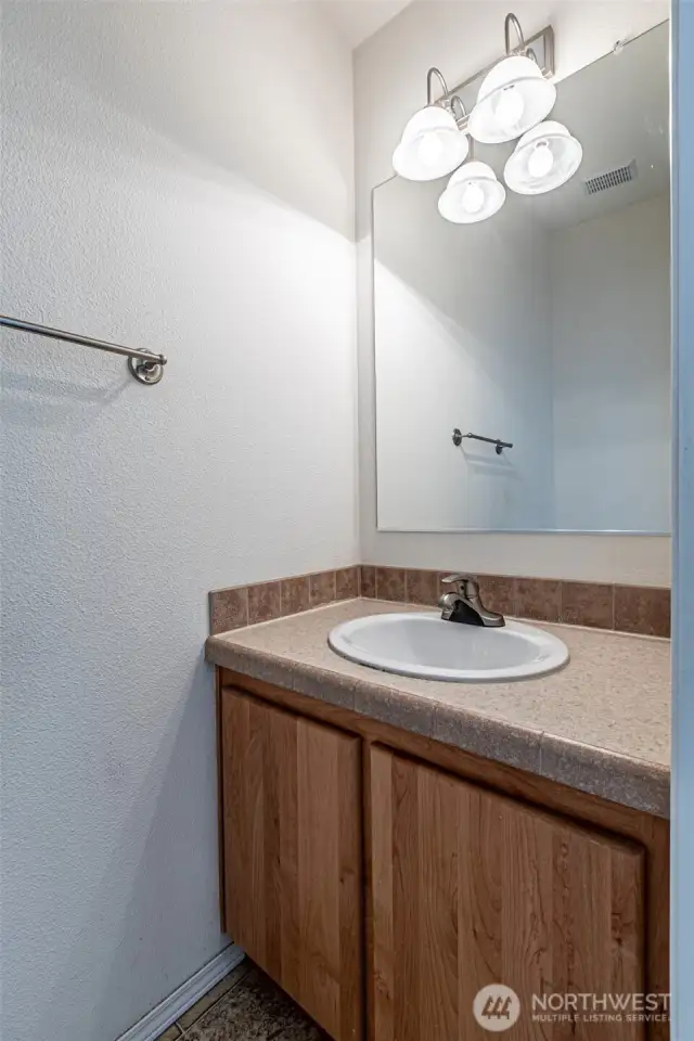 Powder room off of utility room