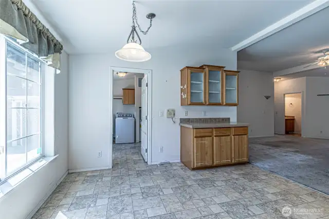 Dining nook looking into utility room
