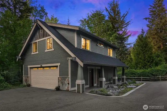 4 car drive through 1200sf detached shop with utility sink.  1080 sf 1-bedroom MIL upstairs with private entrance.