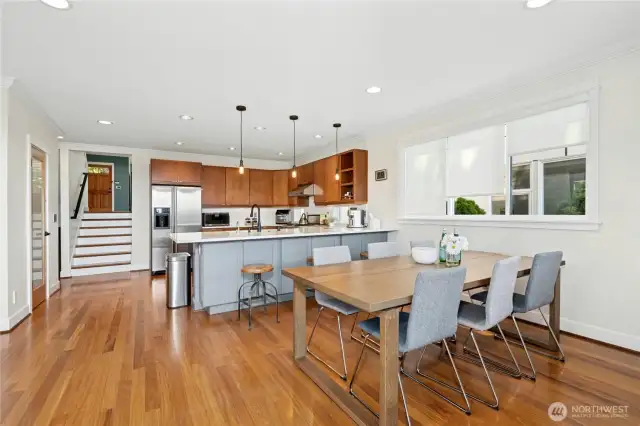 Sensor faucet, hot water on demand, KitchenAid disposal, and smart electric pop-up outlet  Walk-in pantry with quartz counter and a dedicated mini LG fridge