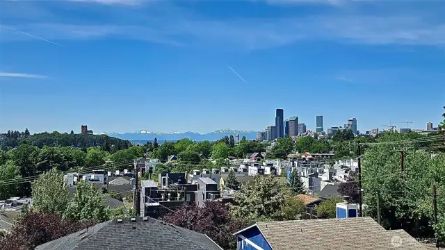 Unobstructed panoramic views of the Olympic Mountains, Lake Washington, and the Seattle skyline from every level of the home