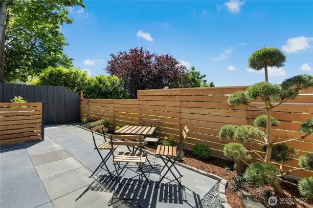 Backyard: new cedar fencing, paved side yards, and a tranquil zen garden