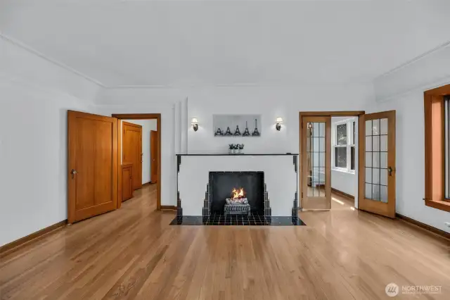 The great room feels like an art gallery! Kitchen to the right, entry to left.