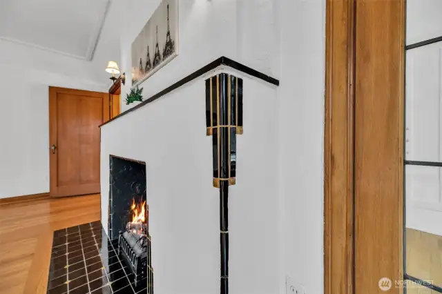 Fireplace details include original gold brass & black tiles.