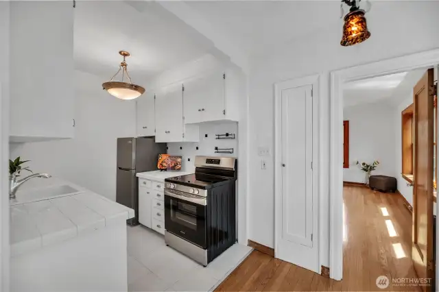 To the right is another entry to the bedroom.