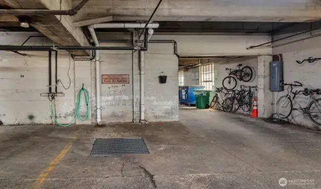 Car wash and bike storage in garage.