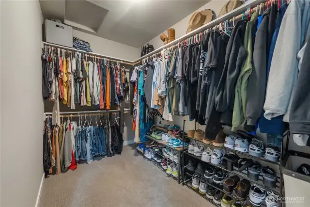 WALK IN CLOSET on your way to the primary en suite bathroom