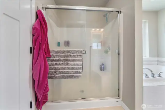 In here you'll find walk in shower and soaking tub