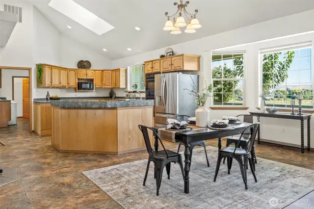Casual dining off the kitchen island, complete with a prep sink