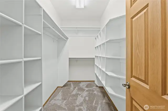 Spacious primary suite walk-in closet