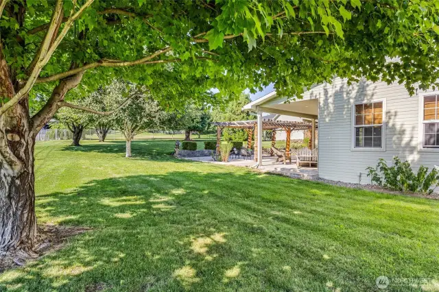A full acre of landscaped lawn and gardens
