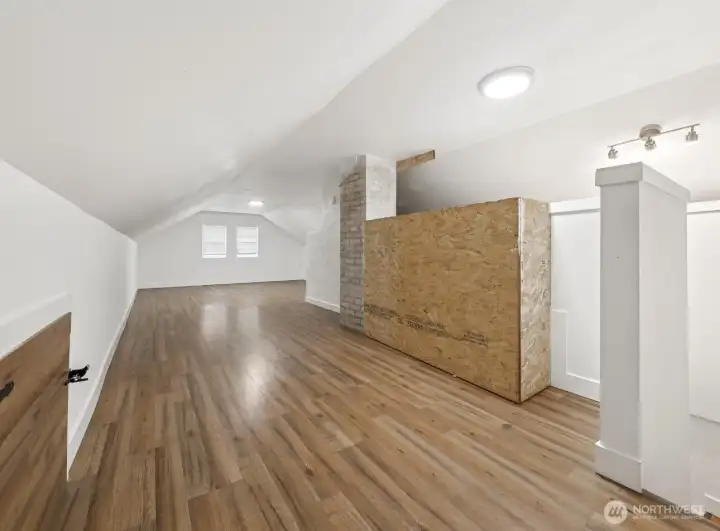 attic loft where you can create a large walk-in closet or a fourth bedroom